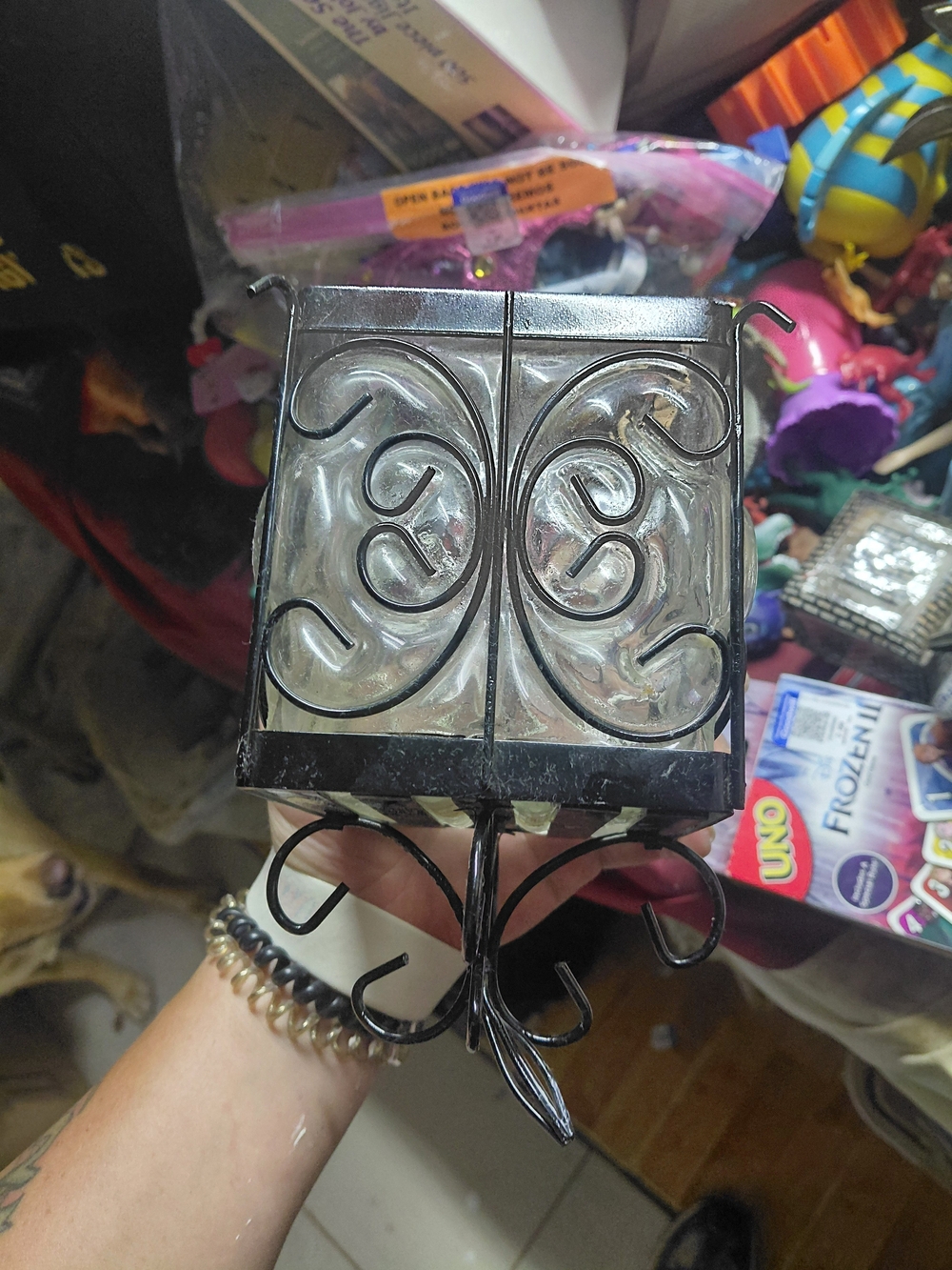vintage black wrought-iron and glass candle holder